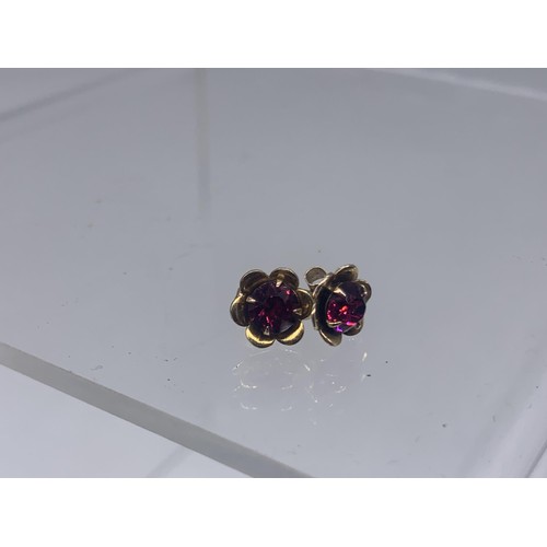 643 - A PAIR OF 9ct OLD GARNET SET EARRINGS