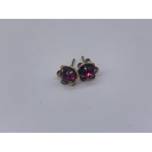 643 - A PAIR OF 9ct OLD GARNET SET EARRINGS