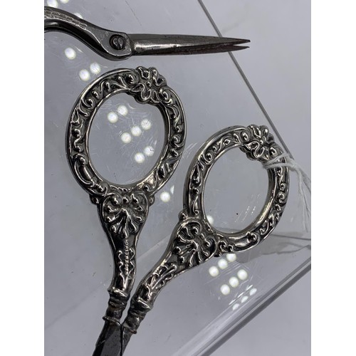 607 - 3 PAIRS OF ORNATE SCISSORS -2X SILVER HANDLED AND 1 STORK HANDLE