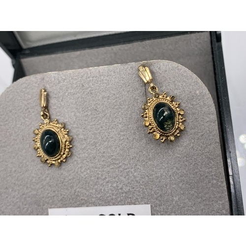 615 - A PAIR OF 9ct GOLD SAPPHIRE EARRINGS