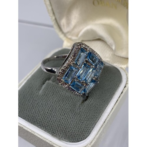 623 - A SILVER BLUE CRYSTAL RING