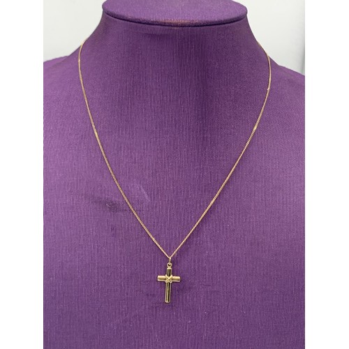 626 - 9ct GOLD CROSS ON A 9ct CHAIN 2.1grms