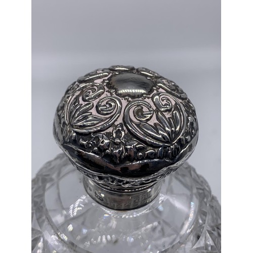 630 - HEAVY CUT GLASS PERFUME BOTTLE WITH SILVER TOP AND STOPPER WALKER AND HALL BIRMINGHAM 1901