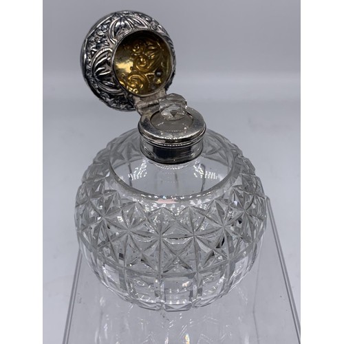 630 - HEAVY CUT GLASS PERFUME BOTTLE WITH SILVER TOP AND STOPPER WALKER AND HALL BIRMINGHAM 1901