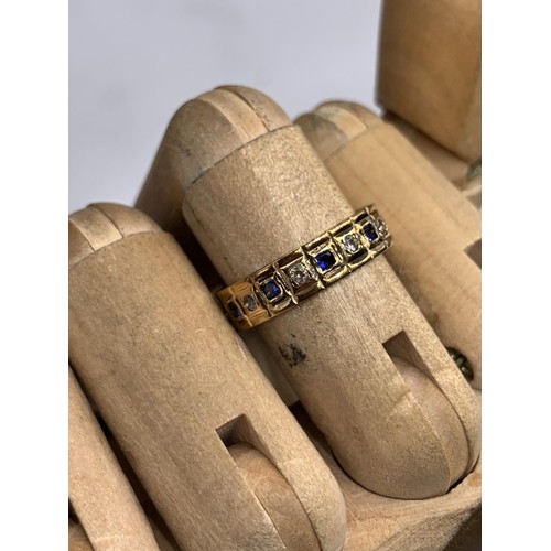 642 - AN ORNATE 9ct GOLD DIAMOND AND SAPPHIRE ETERNITY RING SIZE M/N 3.1grms