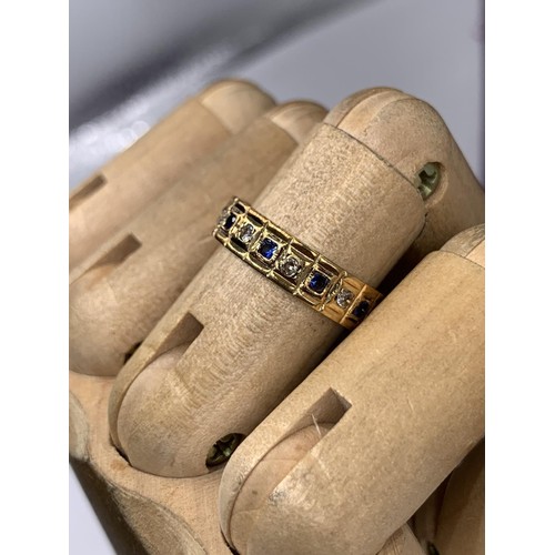 642 - AN ORNATE 9ct GOLD DIAMOND AND SAPPHIRE ETERNITY RING SIZE M/N 3.1grms