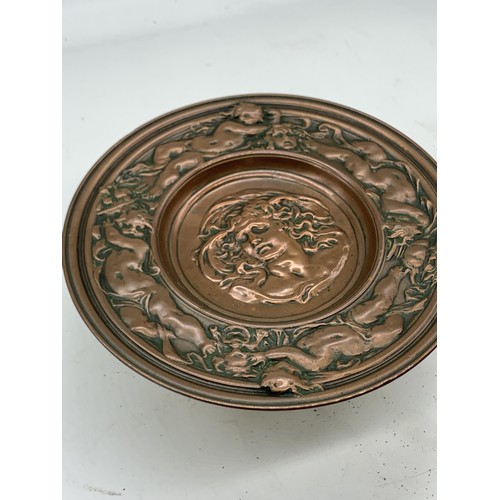 739 - AN ART NOVEAU COPPER AND BRASS COMPORT WITH LADY TO CENTRE AND SURROUND WITH CHERUBS 7