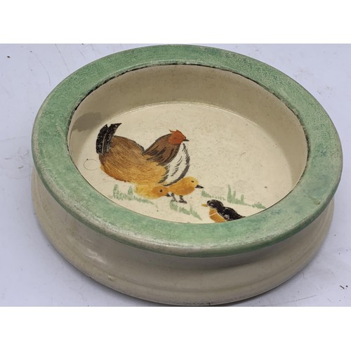 750A - A ROYAL DOULTON STONEWARE BOWL DEPICTING CHICKEN AND DUCKILING 6in Dia