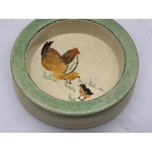 750A - A ROYAL DOULTON STONEWARE BOWL DEPICTING CHICKEN AND DUCKILING 6in Dia