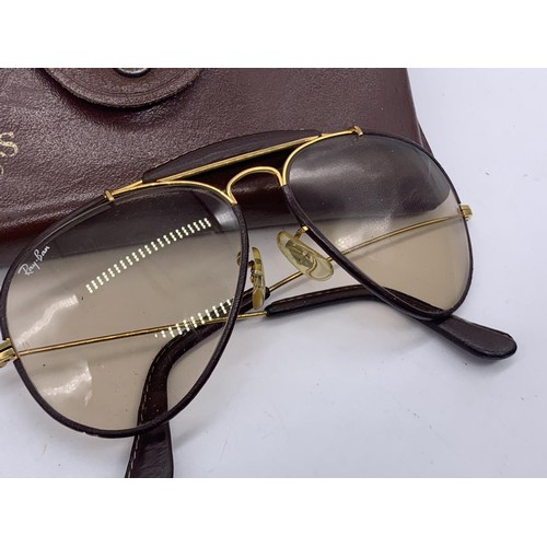 768 - A GENUINE PAIR OF RAY BAN SUNGLASSES IN ORIGINAL LEATHER WALLET