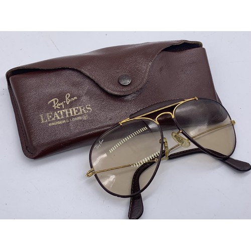 768 - A GENUINE PAIR OF RAY BAN SUNGLASSES IN ORIGINAL LEATHER WALLET