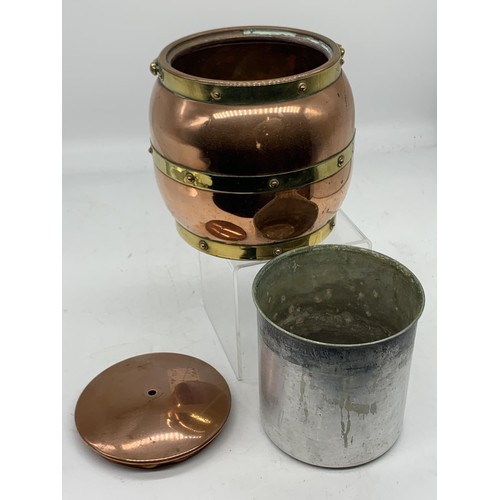 773 - A COPPER AND BRASS  BARRELL TEA  CADDY BY LINTON