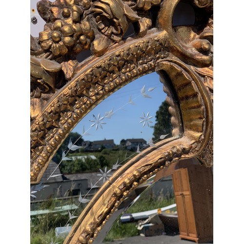 776 - VERY ORNATE GILT DESIGNER STYLE MIRROR 55 x 36