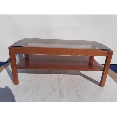 814 - A RETRO SMOKED GLASS COFFEE TABLE