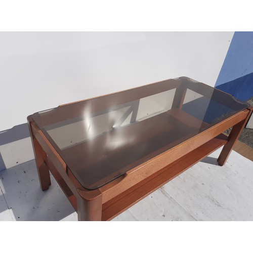 814 - A RETRO SMOKED GLASS COFFEE TABLE