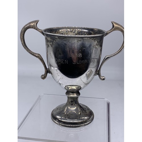 656 - A 1938 B.L.H OPEN JUMPING SOLID SILVER CUP 106.4grms