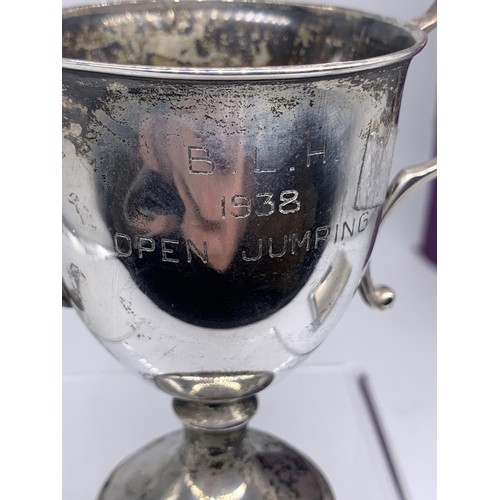 656 - A 1938 B.L.H OPEN JUMPING SOLID SILVER CUP 106.4grms