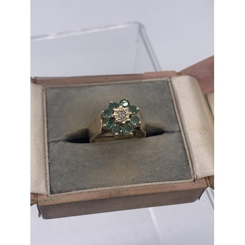 665 - A 9ct GOLD EMERALD AND DIAMOND RING size M/N 3.6grms