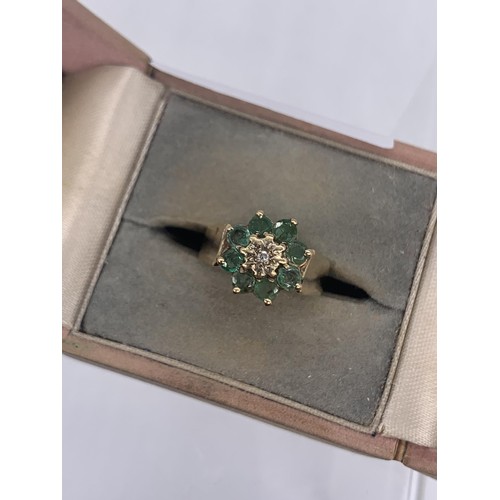 665 - A 9ct GOLD EMERALD AND DIAMOND RING size M/N 3.6grms