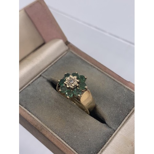 665 - A 9ct GOLD EMERALD AND DIAMOND RING size M/N 3.6grms