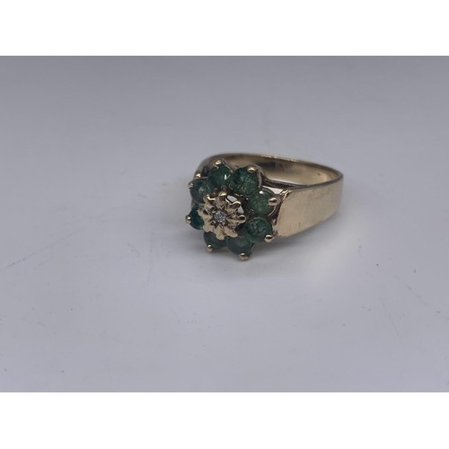 665 - A 9ct GOLD EMERALD AND DIAMOND RING size M/N 3.6grms