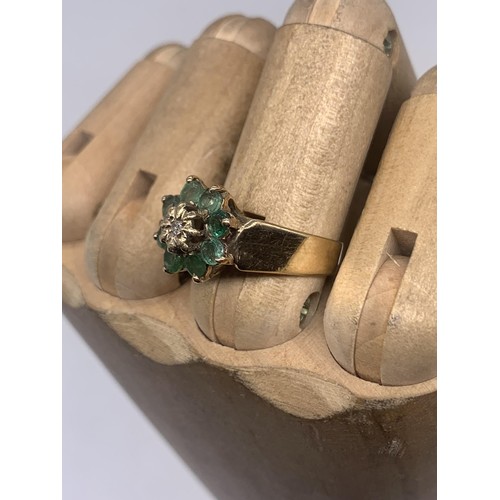 665 - A 9ct GOLD EMERALD AND DIAMOND RING size M/N 3.6grms