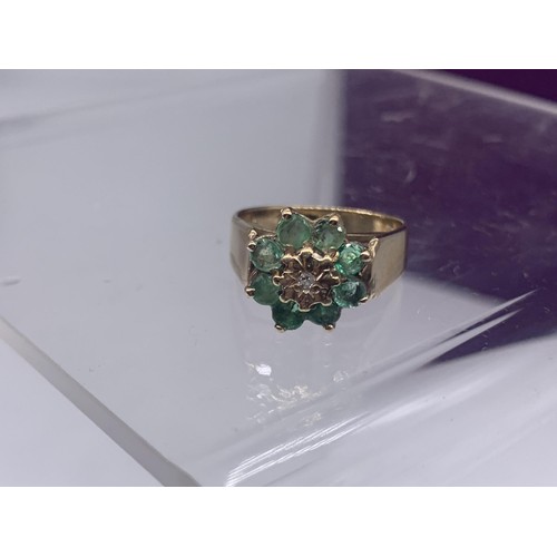 665 - A 9ct GOLD EMERALD AND DIAMOND RING size M/N 3.6grms