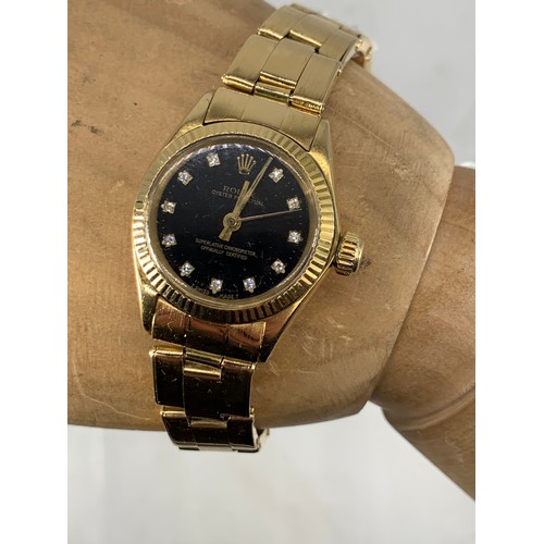 669 - ROLEX OYSTER PERPETUAL 1970’S SMALL BLACK DIAL DIAMOND SET TO NUMERALS IN P.W.O ALL IN 18ct YELLOW G... 