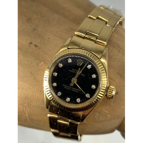 669 - ROLEX OYSTER PERPETUAL 1970’S SMALL BLACK DIAL DIAMOND SET TO NUMERALS IN P.W.O ALL IN 18ct YELLOW G... 