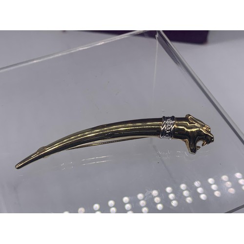 676 - A STUNNING 9ct GOLD (4.6grms) JAGUAR BROOCH