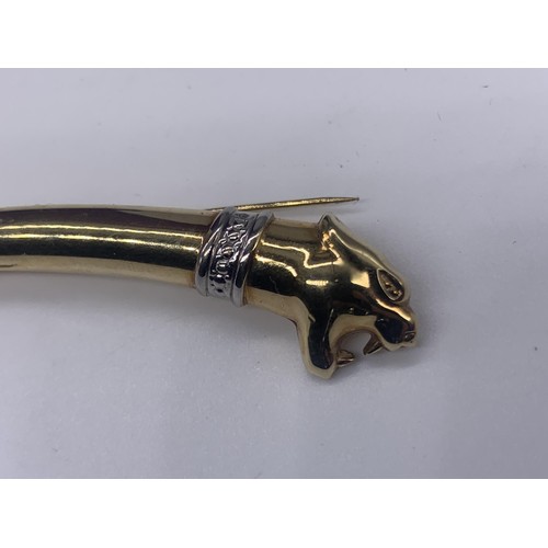 676 - A STUNNING 9ct GOLD (4.6grms) JAGUAR BROOCH