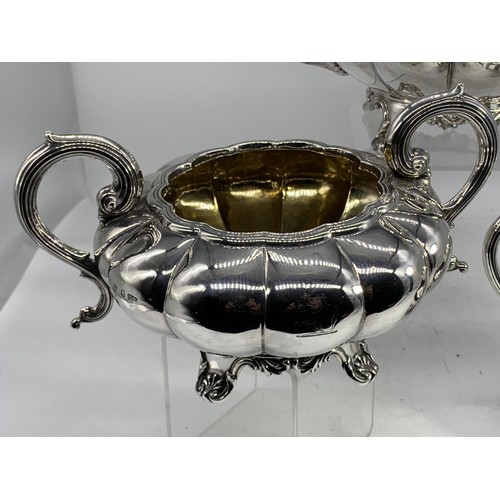 683 - A BEAUTIFULLY ORNATE SHEFFIELD SILVER 3 PIECE TEA SERVICE 1315.4grms