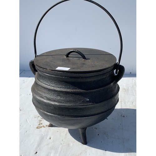 690 - A CAST CAULDRON 11