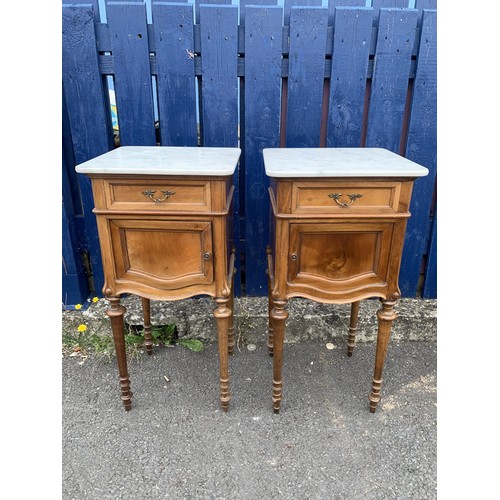 691 - A PAIR OF CARVED FRUITWOOD MARBLE TOPPED SINGLE DRAWERED CABINETS WITH MARBLE INSETS 34x15x15in