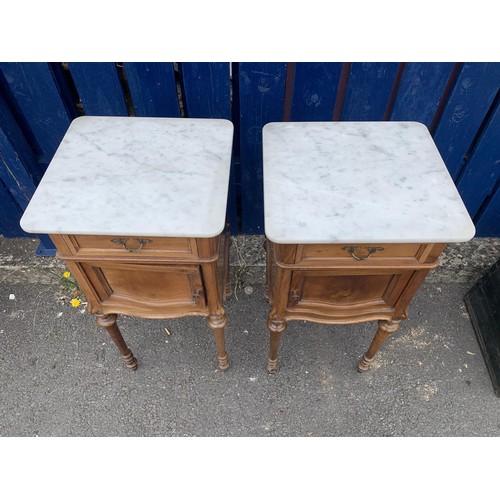 691 - A PAIR OF CARVED FRUITWOOD MARBLE TOPPED SINGLE DRAWERED CABINETS WITH MARBLE INSETS 34x15x15in