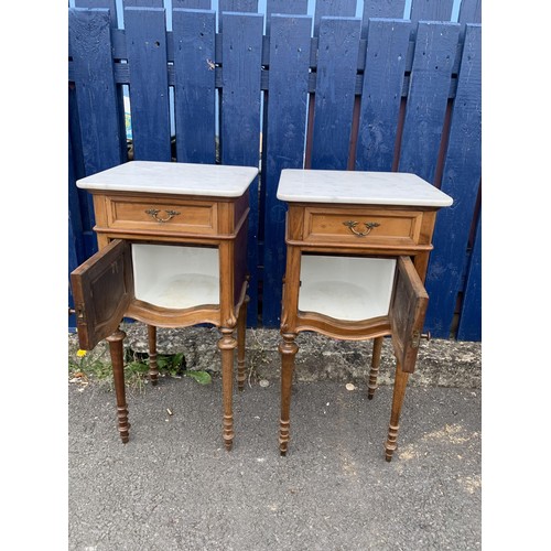 691 - A PAIR OF CARVED FRUITWOOD MARBLE TOPPED SINGLE DRAWERED CABINETS WITH MARBLE INSETS 34x15x15in