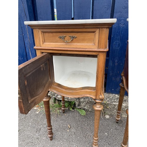 691 - A PAIR OF CARVED FRUITWOOD MARBLE TOPPED SINGLE DRAWERED CABINETS WITH MARBLE INSETS 34x15x15in