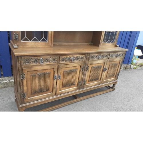 804 - AN ARCHED TOP OLD CHARM DRESSER WITH 2 LEADED GLASS DOORS 73 X 73 X 19IN