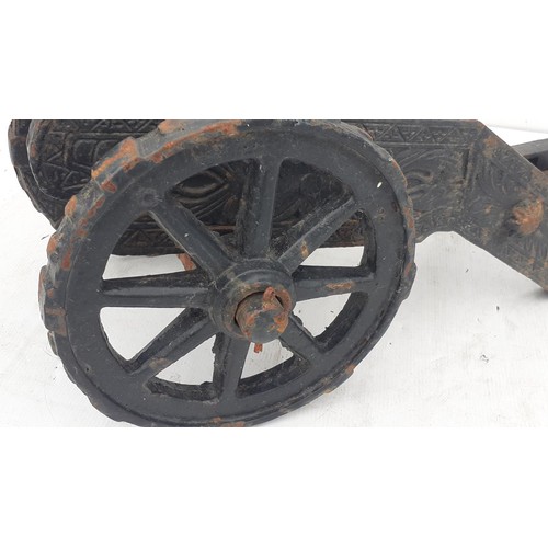 808 - A HEAVY ANTIQUE CAST IRON CANNON 29 X 10IN