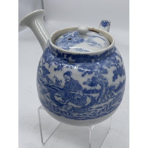 705 - AN ANTIQUE  CHINESE  TEAPOT OR KENDI  WITH MARKS SLIGHT CHIP TO FUNNEL