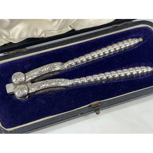 719 - A CASED SET OF ORNATE WALKER AND HALL NUT CRACKERS