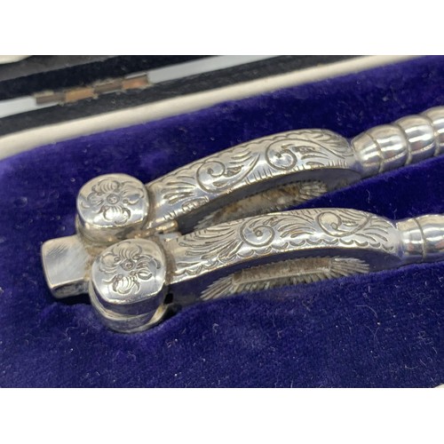 719 - A CASED SET OF ORNATE WALKER AND HALL NUT CRACKERS