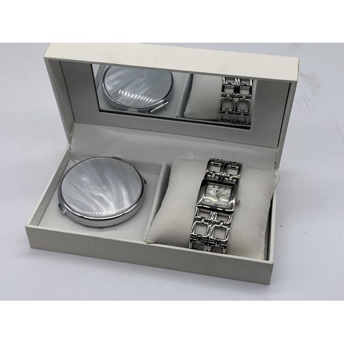 723 - A M.O.P BOXED WATCH AND COMPACT SET