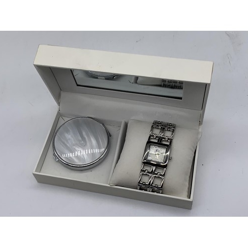 723 - A M.O.P BOXED WATCH AND COMPACT SET