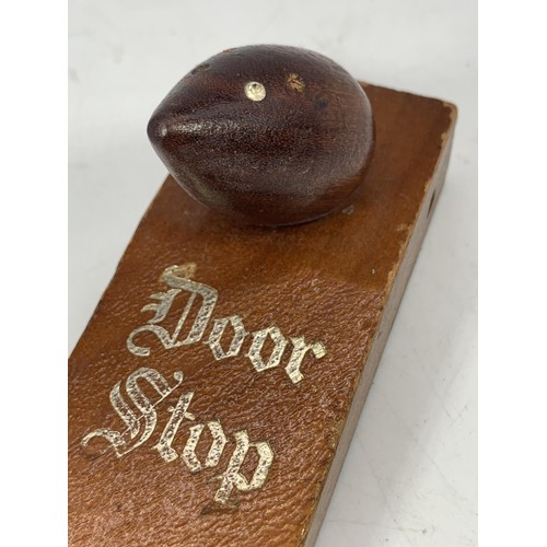 726 - A MOUSEMAN STYLE DOORSTOP BY AVON (WITH ORIGINAL STICKER)