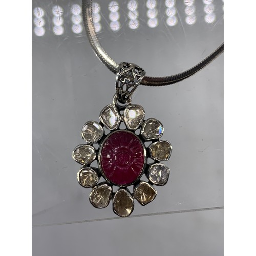 254 - RED STONE & WHITE PENDANT AND RING SET IN SILVER