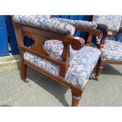 783 - A PAIR OF VICTORIAN WALNUT FRAMED ARMCHAIRS IN A BLUE AND GILT MATERIAL