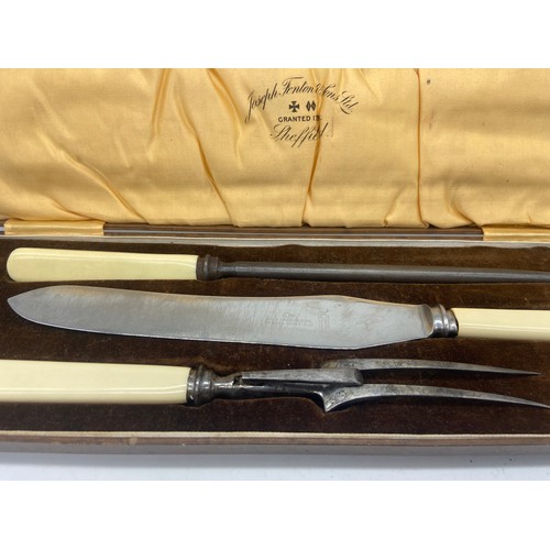 743 - A CASED CARVING SET