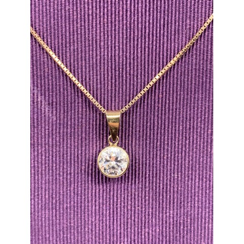 654A - 9ct SOLITAIRE PENDANT ON 9ct CHAIN 2.6 GMS