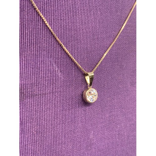 654A - 9ct SOLITAIRE PENDANT ON 9ct CHAIN 2.6 GMS